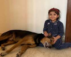 She also has a furry baby alongside her daughter, Nyra. She named the dog, Shiro.